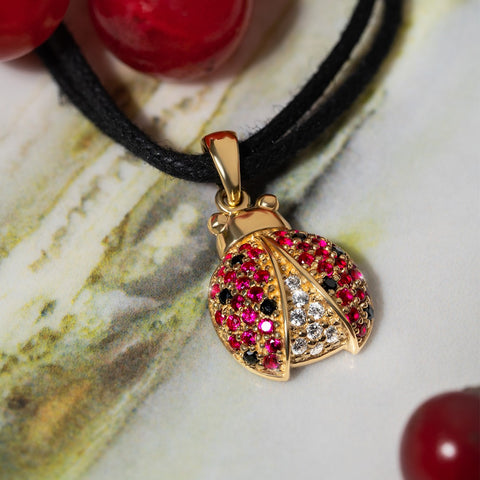 Gargarita pendant on 18K gold chain