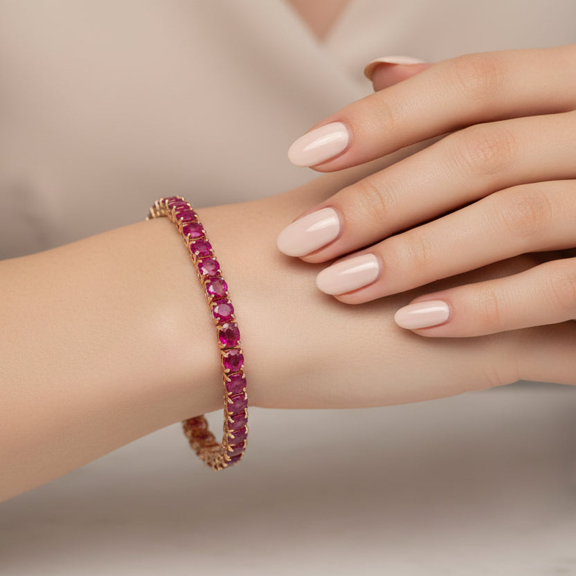 Bratara tennis cu rubine 12.35ct oval cut din aur roz 18k