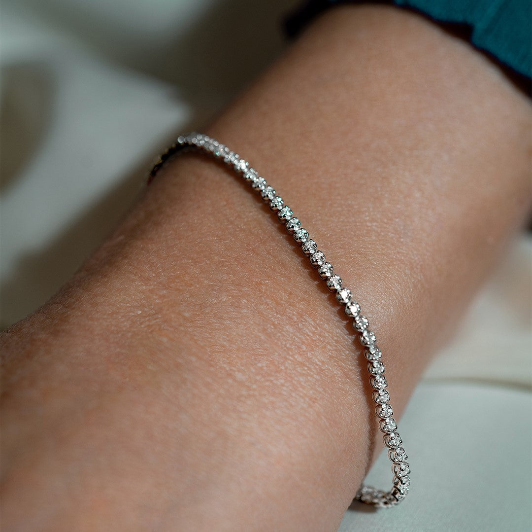 Tennis bracelet with 1.50ct black diamonds in 18K gold