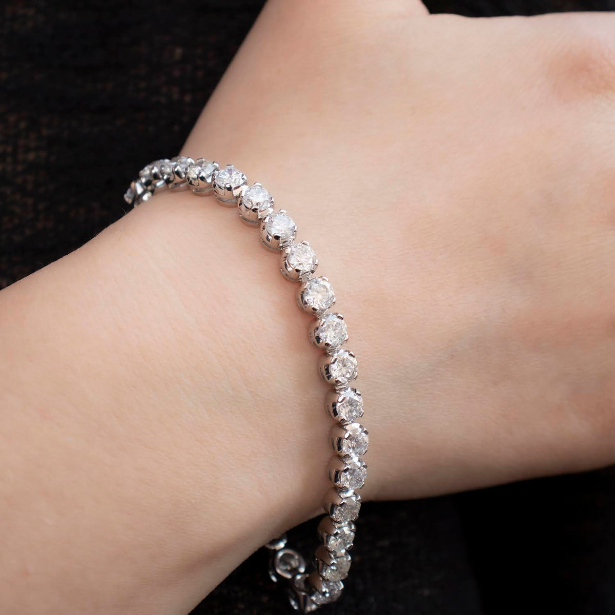 Tennis bracelet with 1.50ct black diamonds in 18K gold