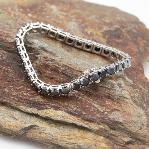 Tennis bracelet with 1.50ct black diamonds in 18K gold