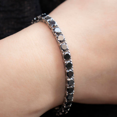 Tennis bracelet with 1.50ct black diamonds in 18K gold