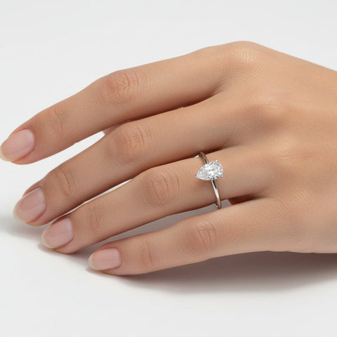 Inel de logodna solitaire cu diamant Pear Cut 0.18ct din aur alb de 18K