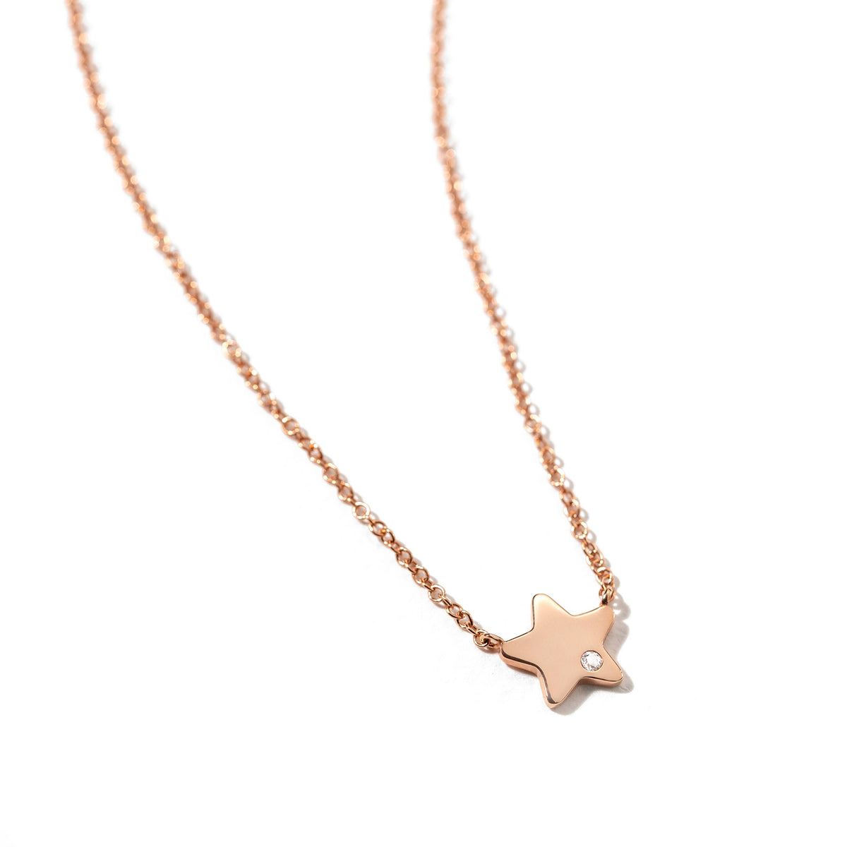 Star pendant with 18K gold zirconia