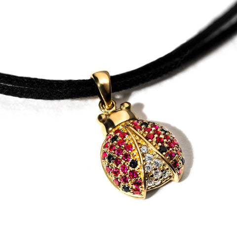 Gargarita pendant on 18K gold chain